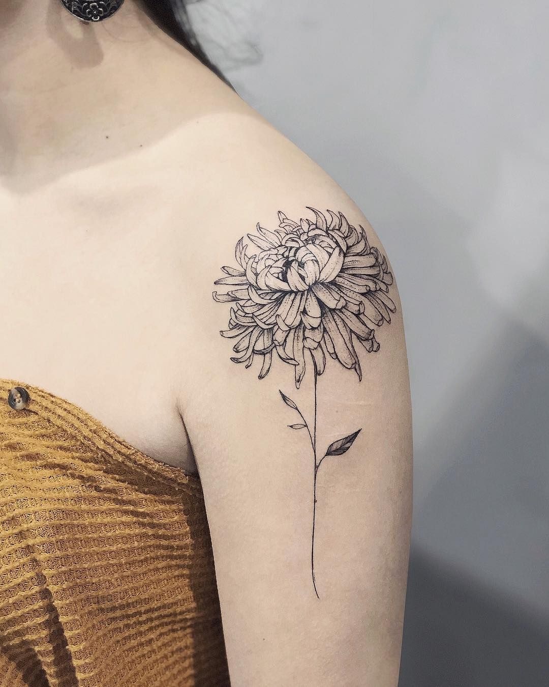 Shoulder-Line Chrysanthemum, a tattoo design rendered in bold.