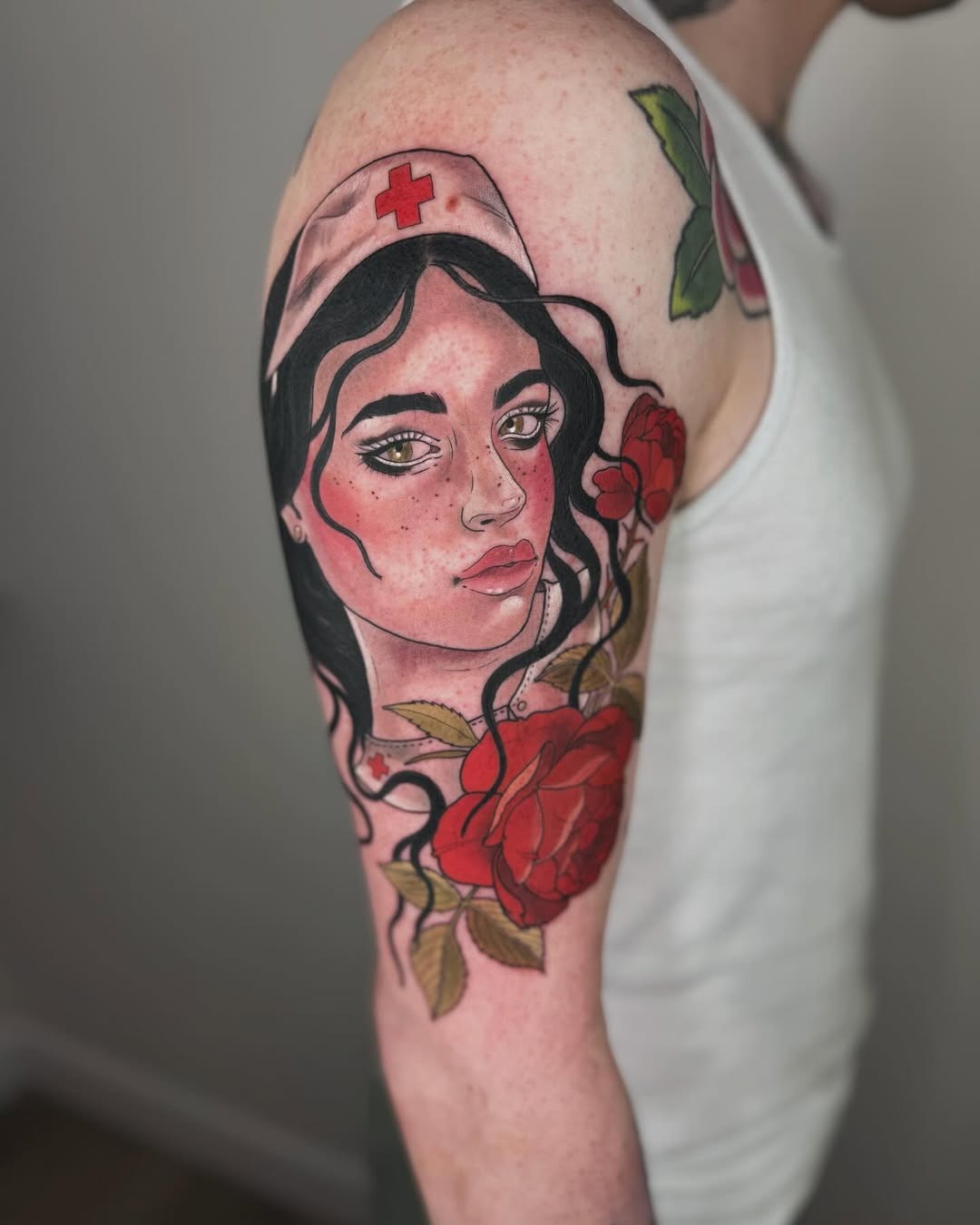 Intricate nurse tattoo with floral elements Tattoo Design
