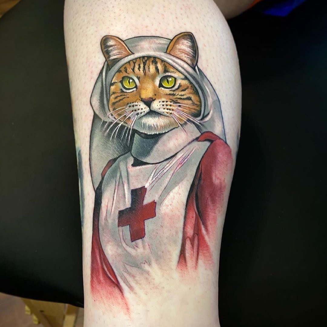 Unique feline-themed nurse tattoo design Tattoo Design