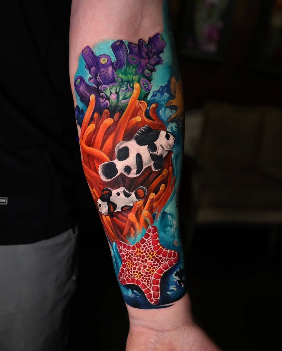 Vibrant Ocean Scene with Playful Cows Tattoo Design