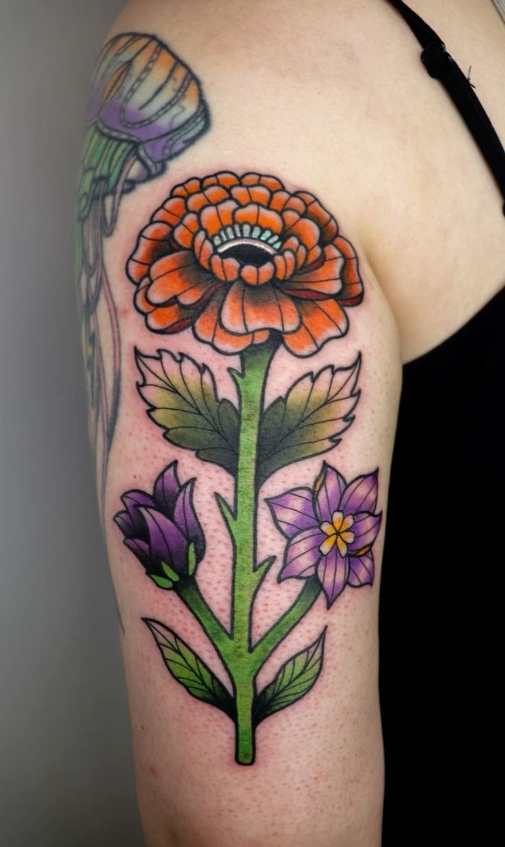 Marigold Wrist Tattoo with Initial Tattoo Design