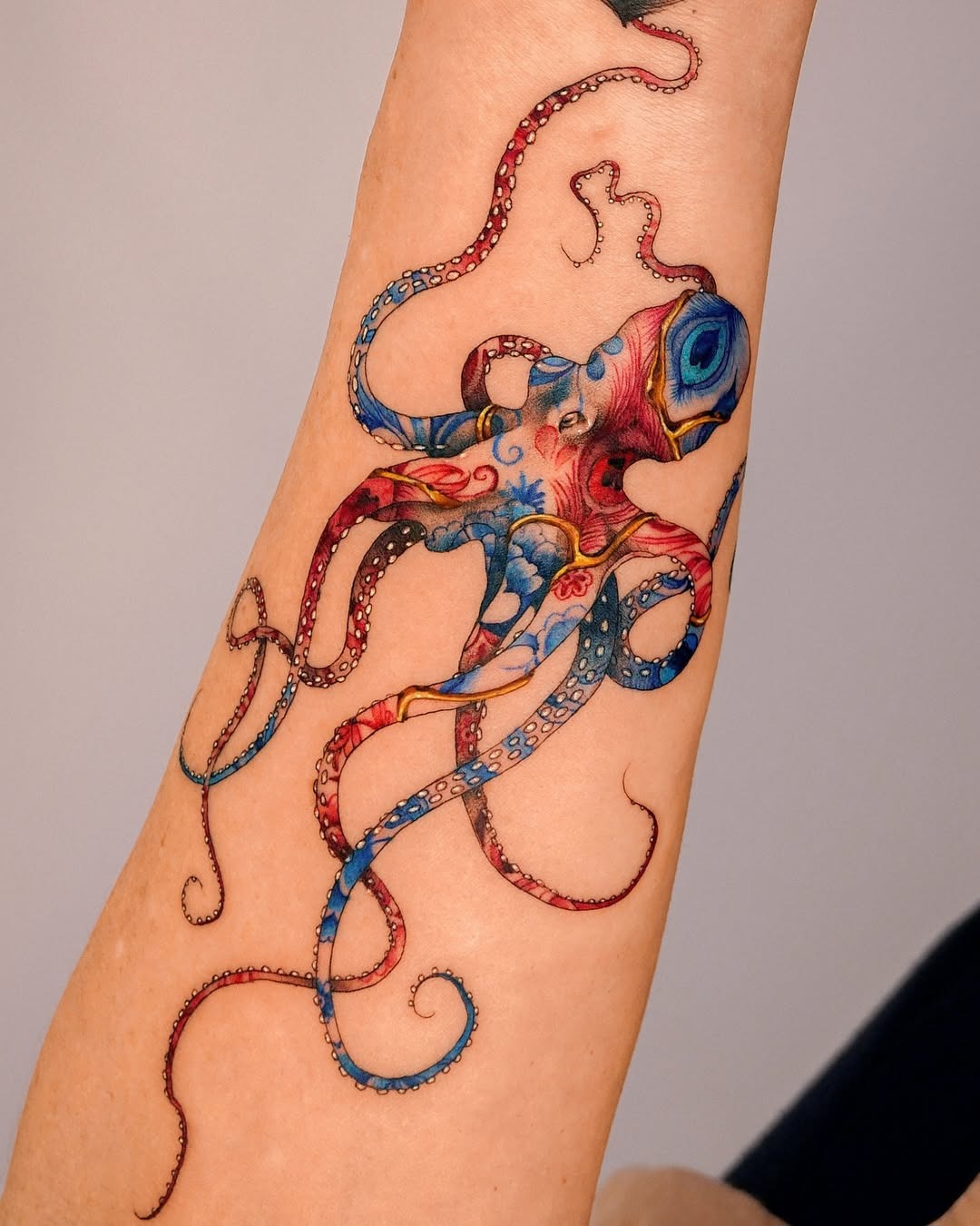 Colorful octopus tattoo with intricate details Tattoo Design