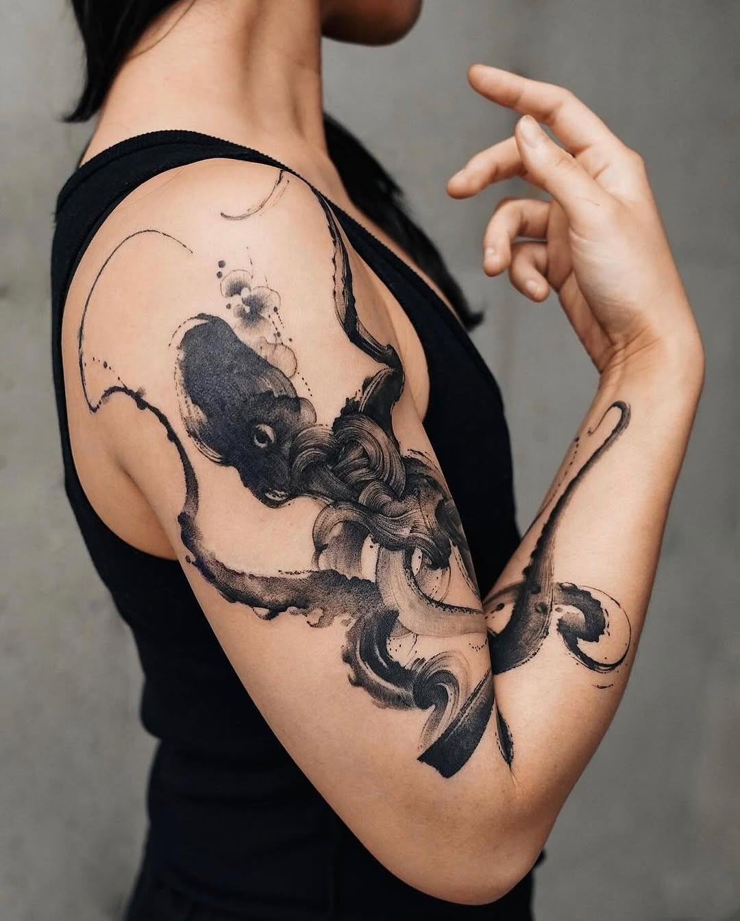 Elegant black ink octopus tattoo design Tattoo Design