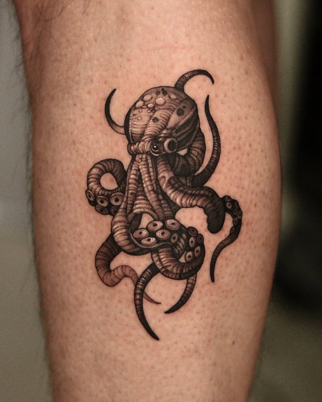 Intricate black ink octopus tattoo design Tattoo Design