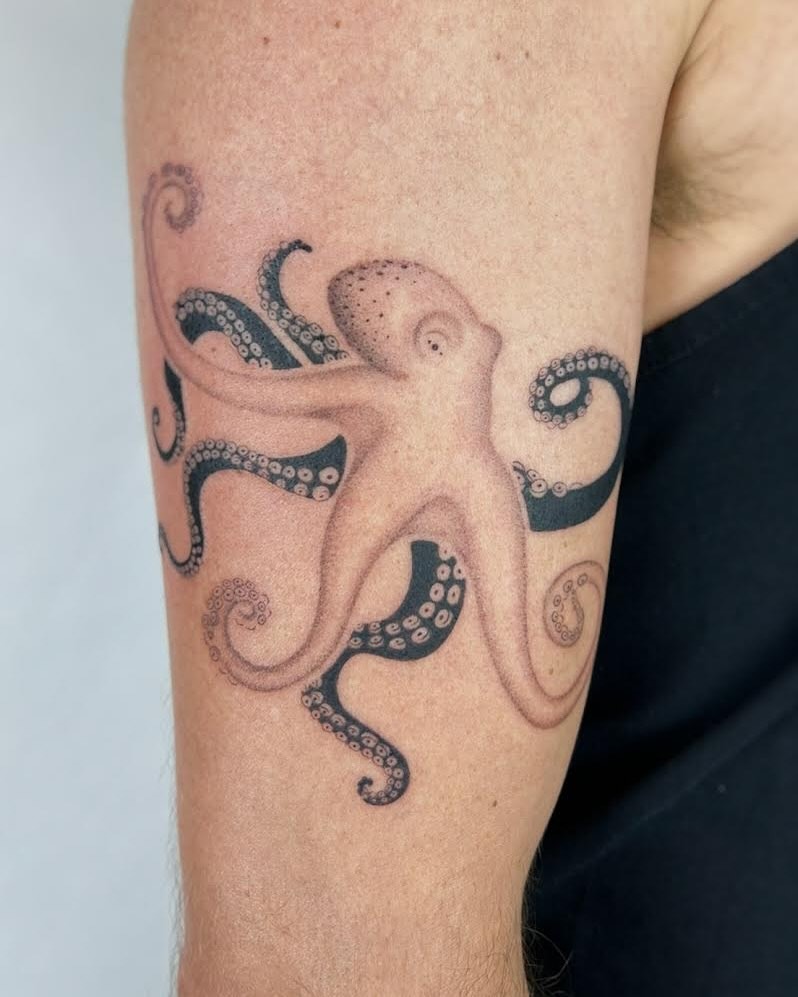 Intricate black outline octopus tattoo design Tattoo Design