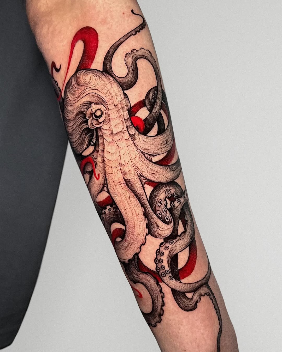 Intricate octopus tattoo with bold colors Tattoo Design
