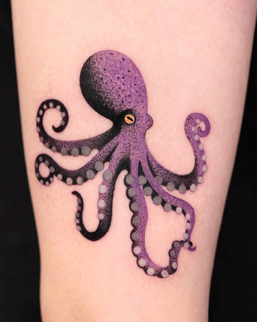 Vibrant purple octopus tattoo with flowing tentacles Tattoo Design