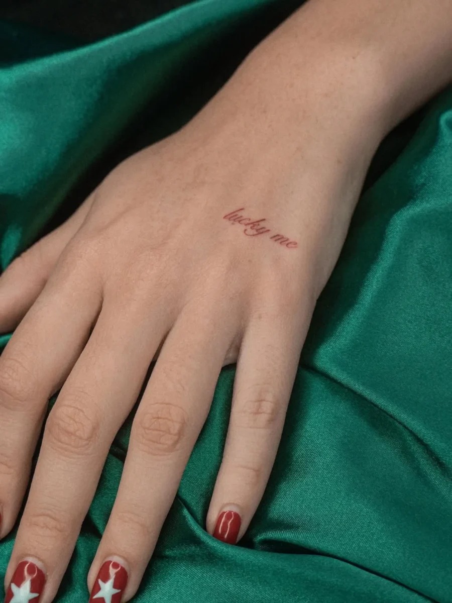 Charming one-word tattoo on the hand Tattoo Design