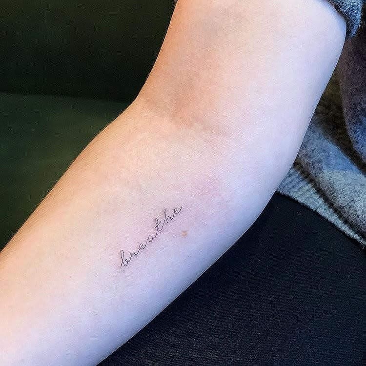 Elegant one-word tattoo for mindfulness Tattoo Design