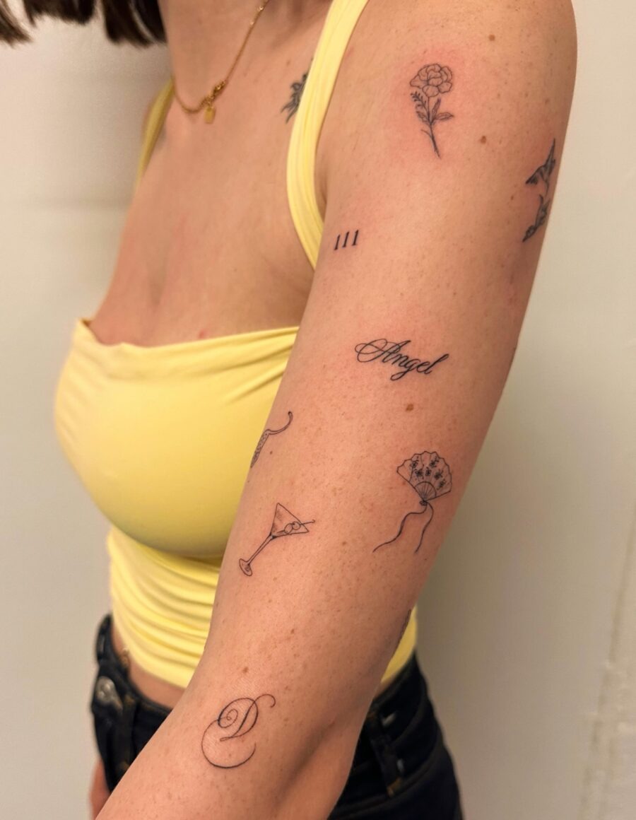 Elegant one-word tattoos with floral accents Tattoo Design
