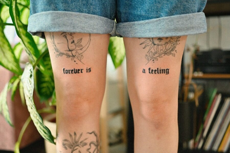 Expressive one-word tattoos on the thighs Tattoo Design