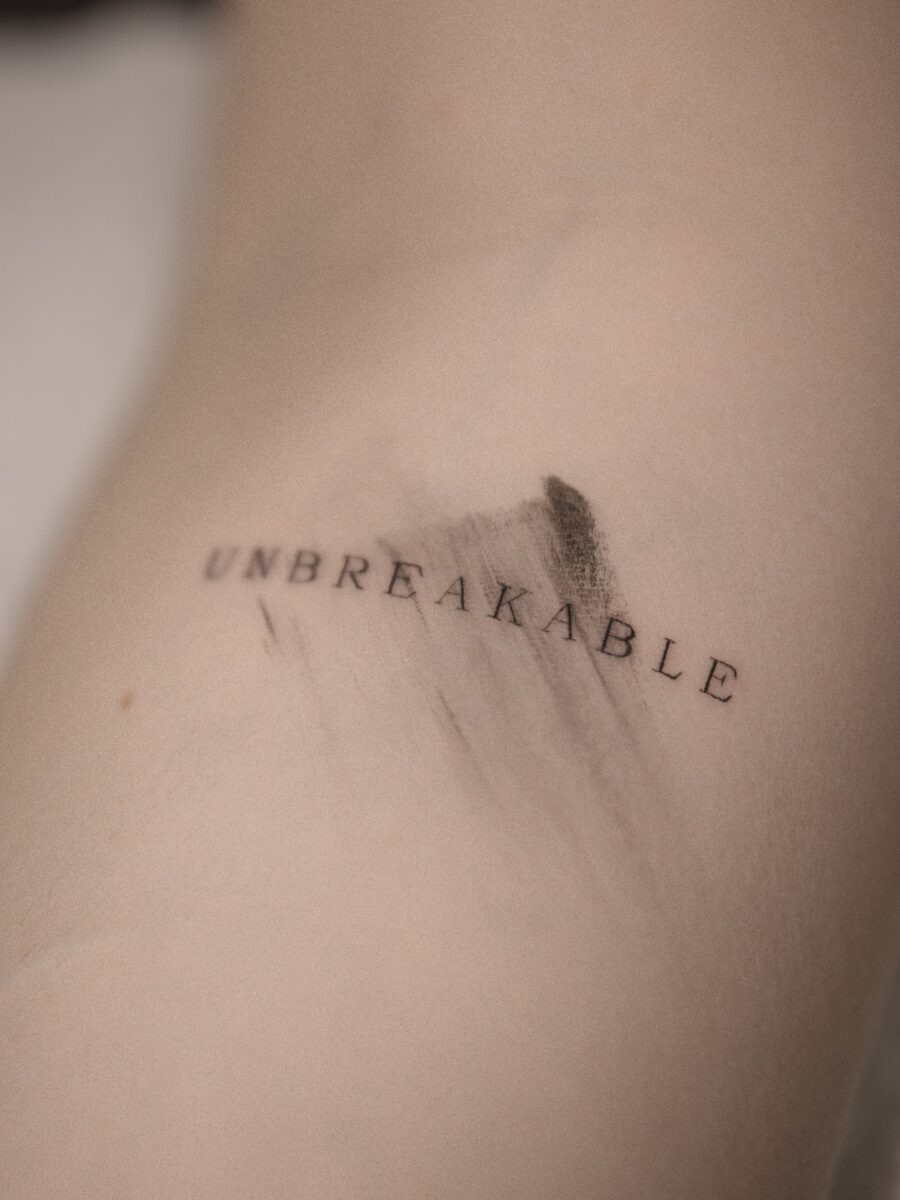 Minimalist tattoo with a powerful message. Tattoo Design