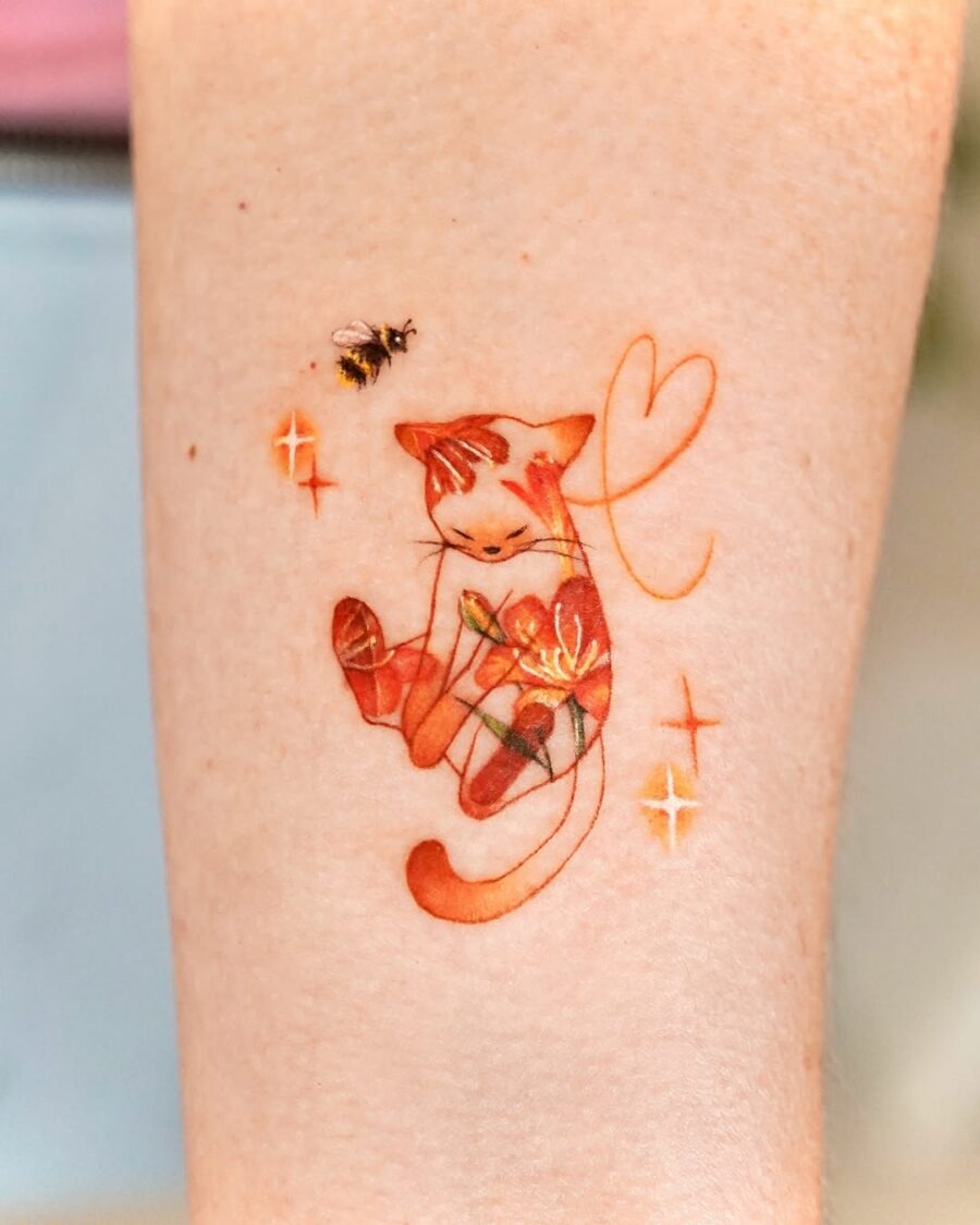 Adorable orange cat tattoo with floral accents Tattoo Design