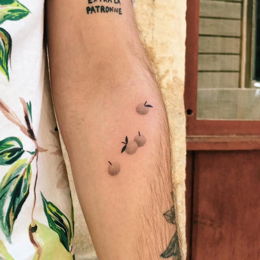 Delicate orange tattoo with minimalistic design Tattoo Design