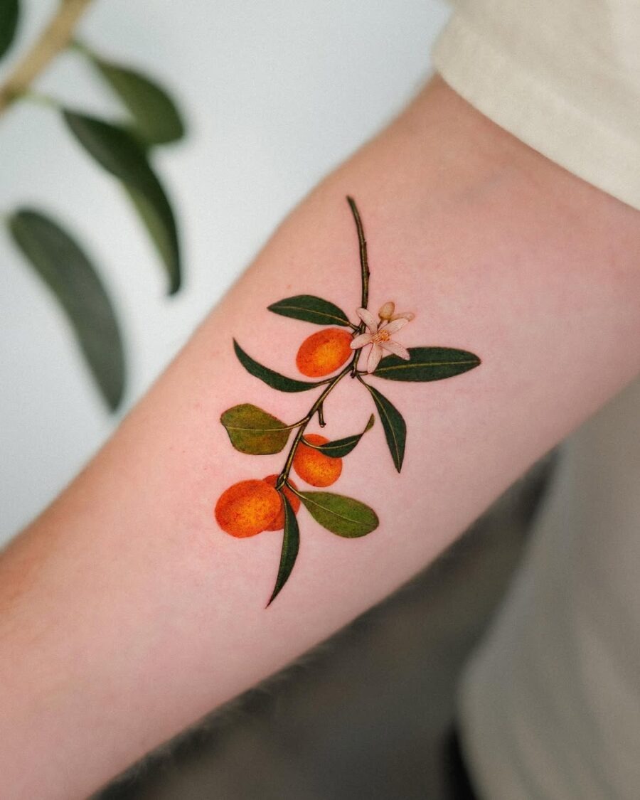 Elegant orange branch tattoo on the forearm Tattoo Design