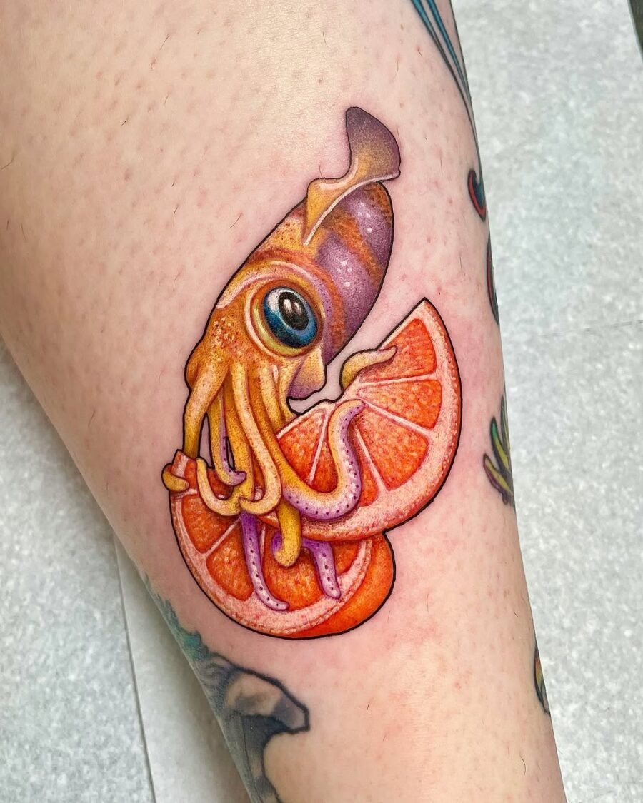 Playful squid with vibrant orange slices Tattoo Design