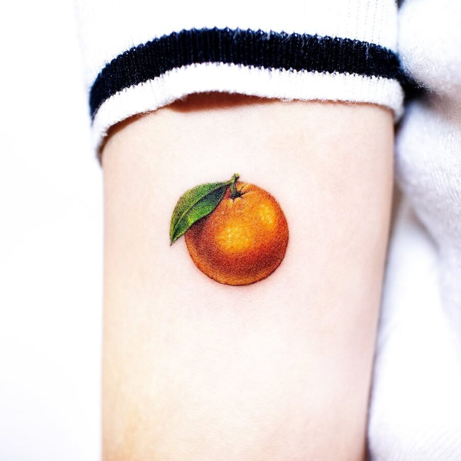 Realistic orange tattoo with vibrant details Tattoo Design