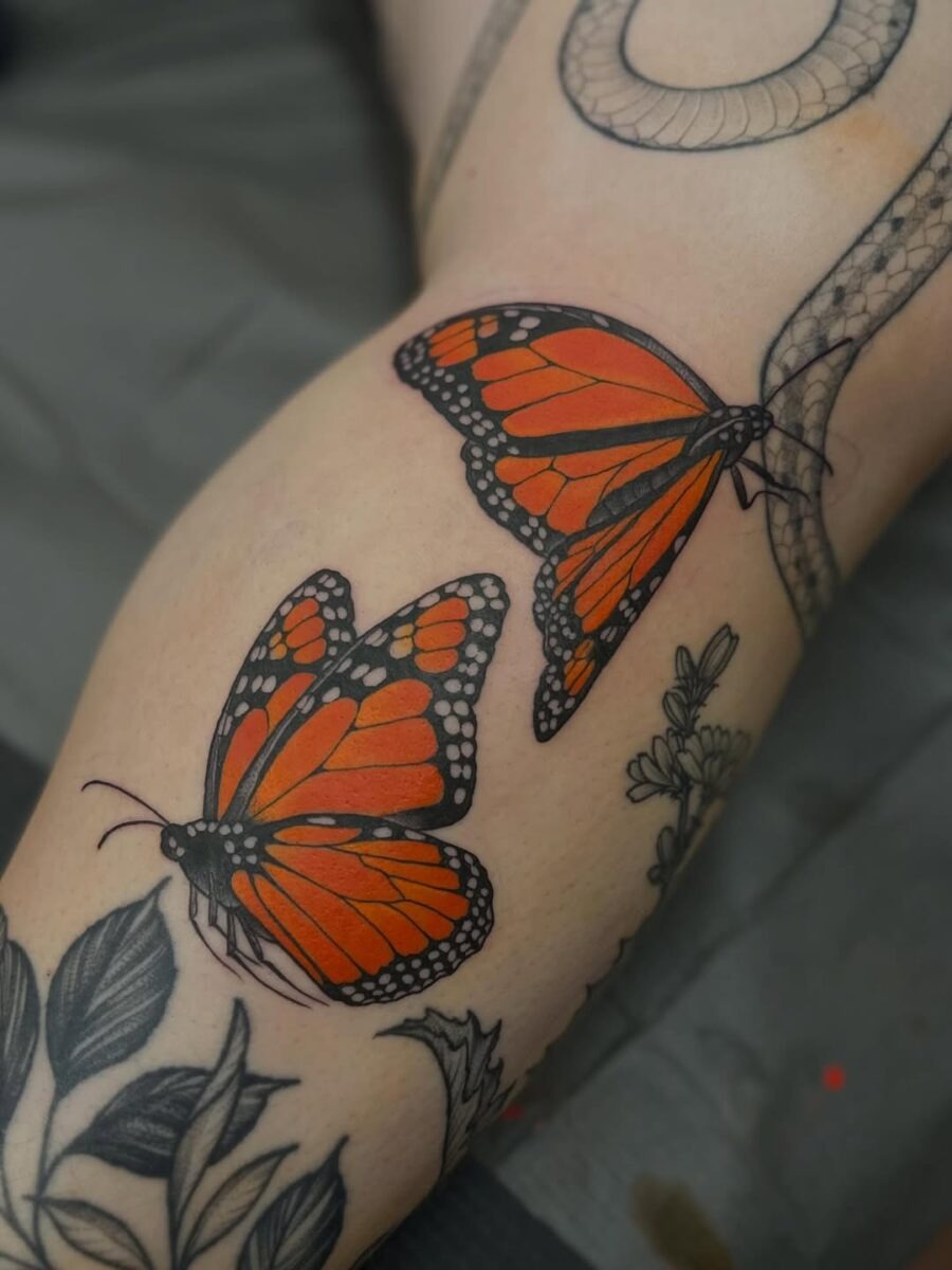 Vibrant orange butterfly tattoos for bold expressions Tattoo Design