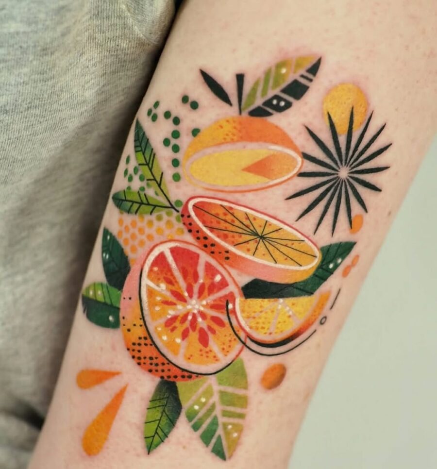 Vibrant Orange Fruit Tattoo with Leaf Details Tattoo Design