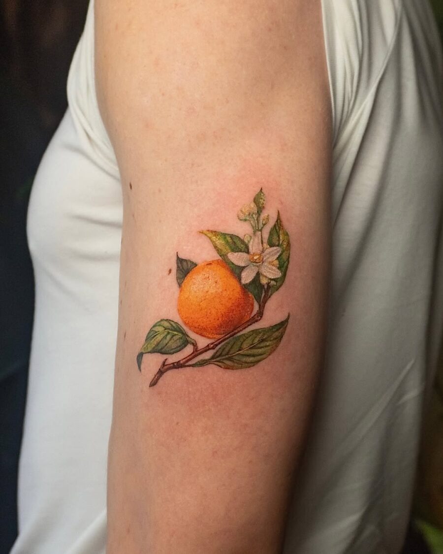 Vibrant orange tattoo with delicate flowers Tattoo Design