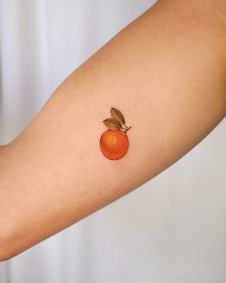 Vibrant orange tattoo with leafy detail Tattoo Design
