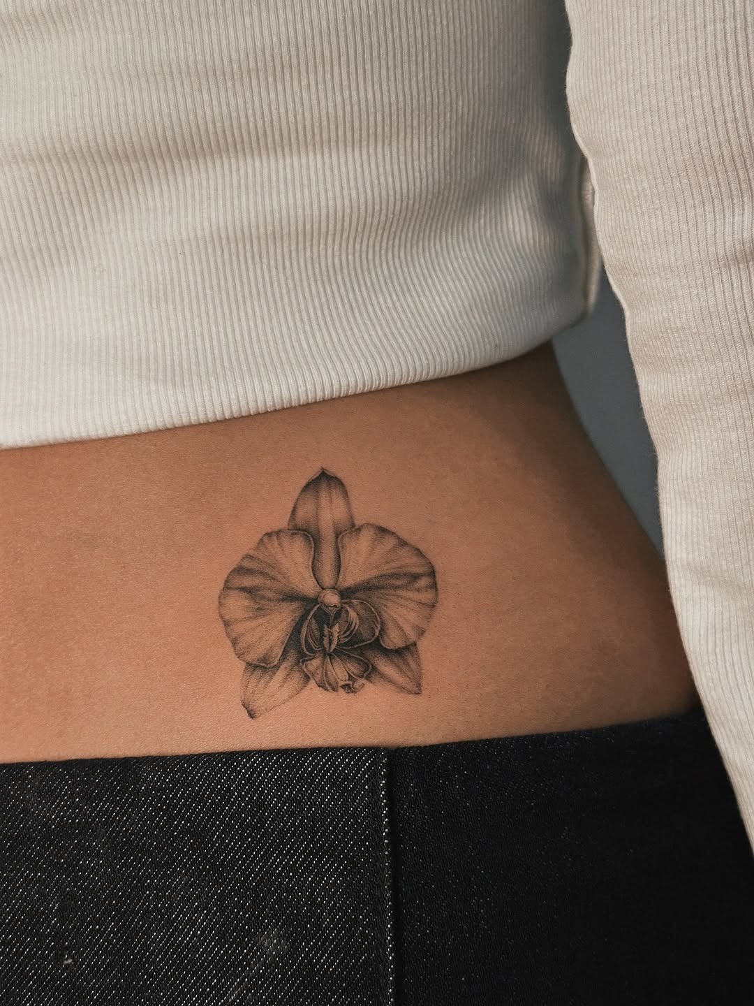 Elegant black and white orchid tattoo design Tattoo Design