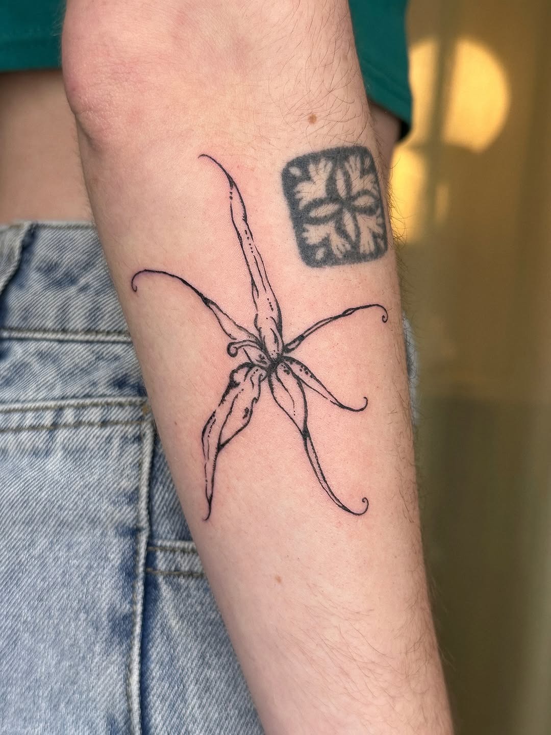 Elegant black outline orchid tattoo design Tattoo Design