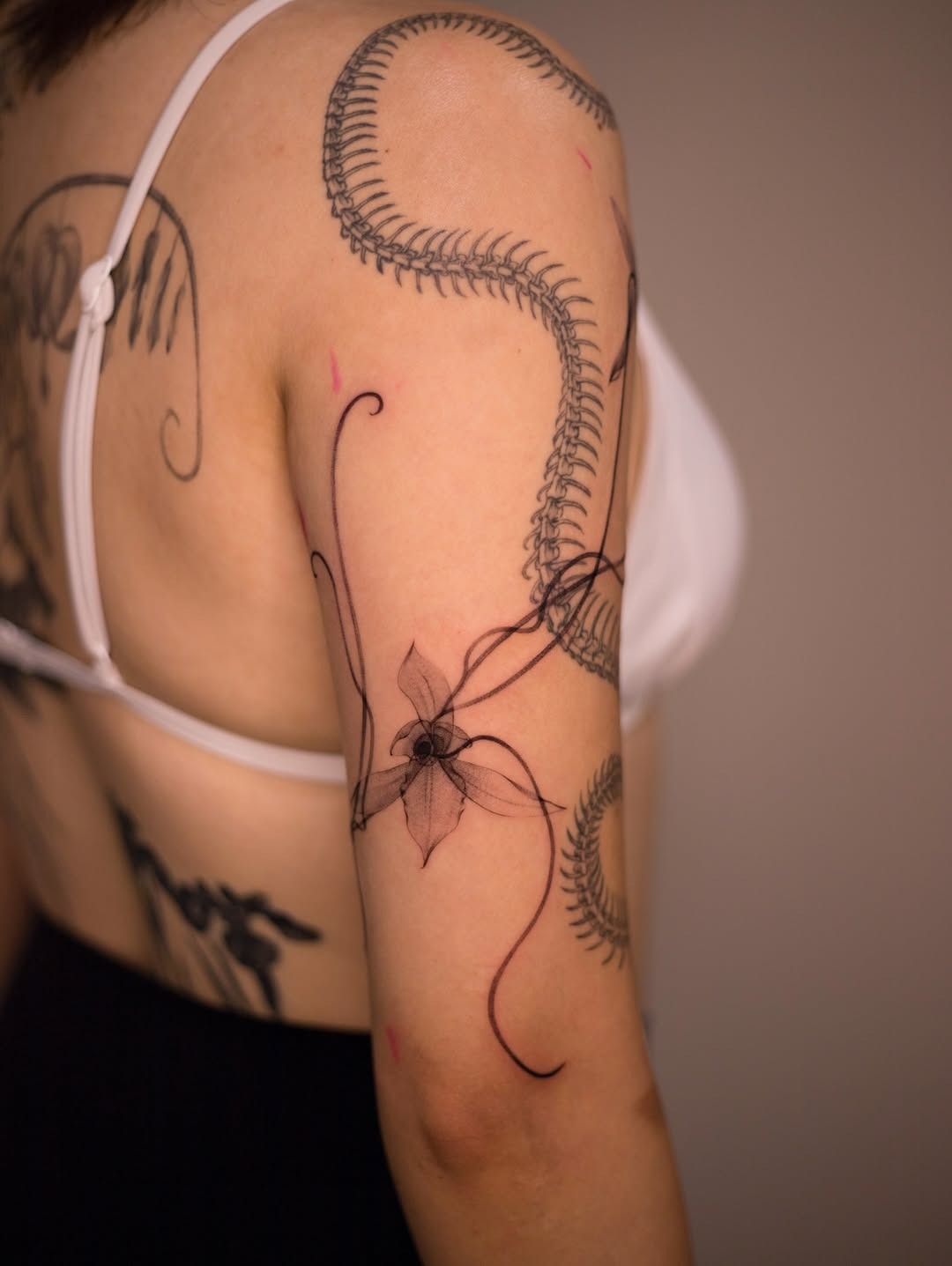 Elegant orchid tattoo with intricate designs Tattoo Design
