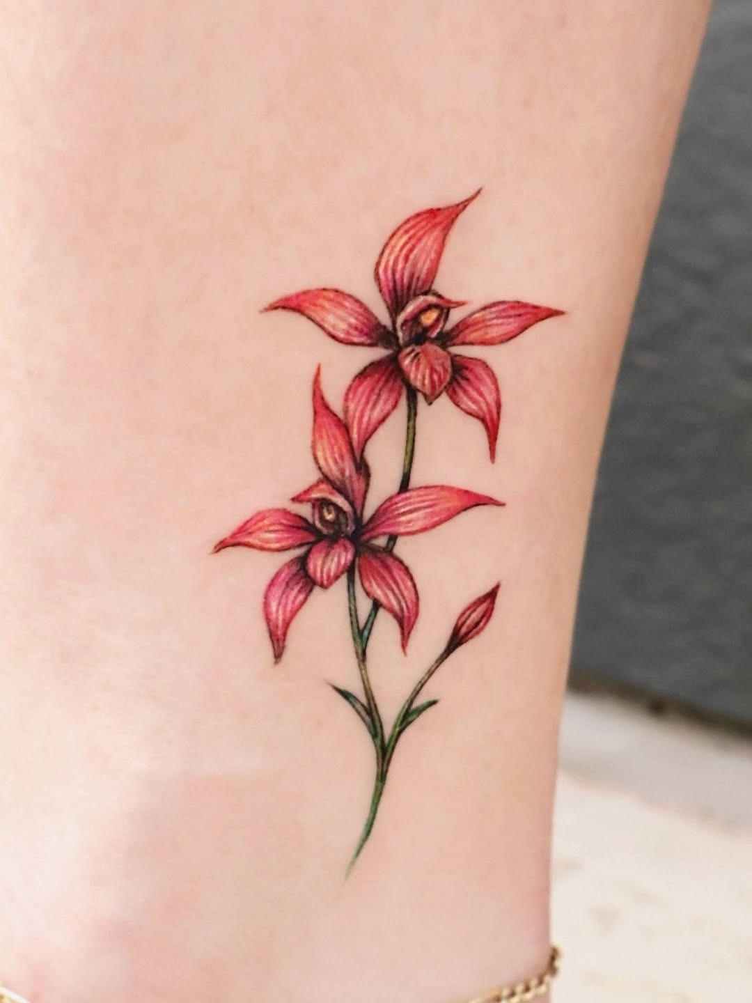 Elegant pink and red orchid tattoo design Tattoo Design