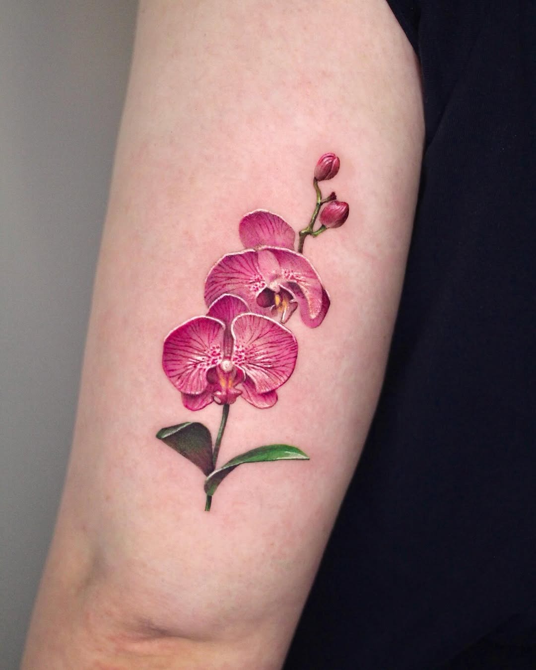 Stunning vibrant orchid tattoo in bloom Tattoo Design