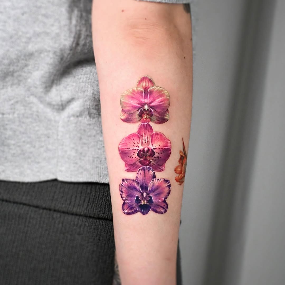 Vibrant orchid tattoo showcasing artistic elegance Tattoo Design
