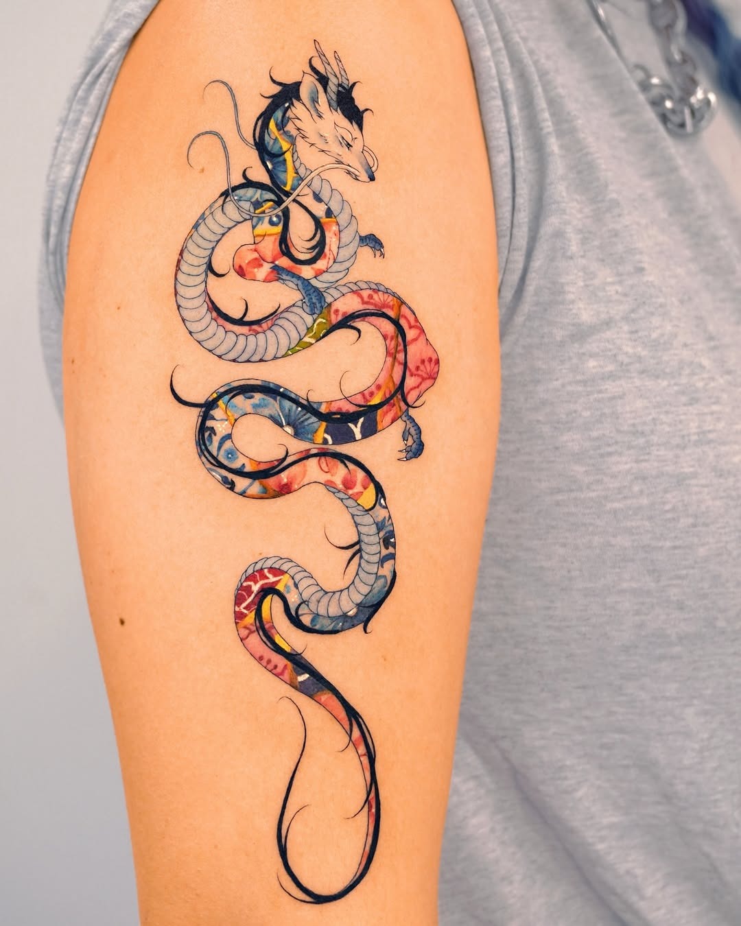A Stunning Dragon Tattoo Coiling Elegantly Tattoo Design