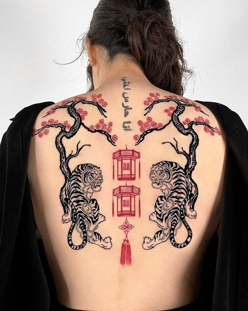 Bold Tigers Representing Strength and Courage Tattoo Design