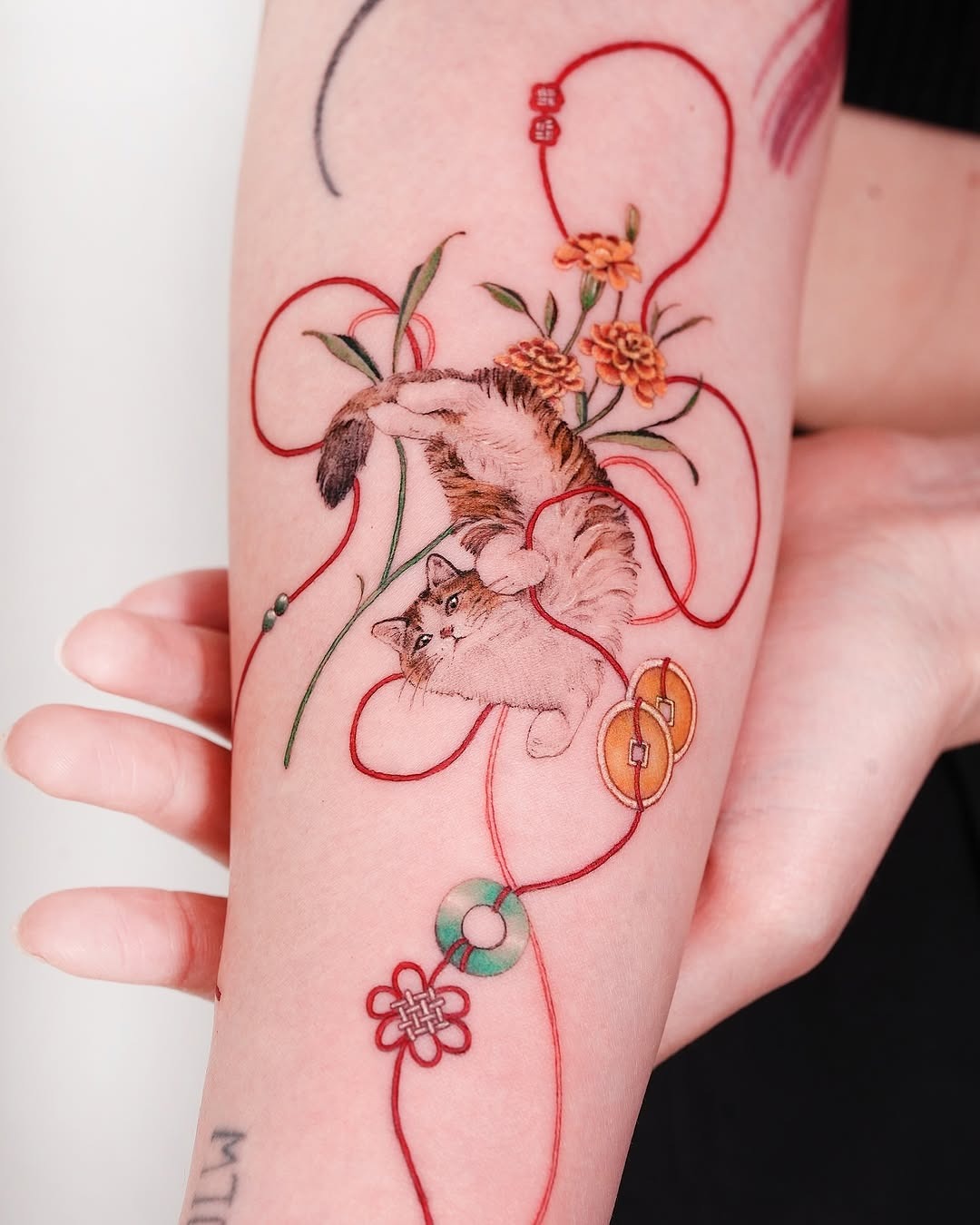 Captivating cat with floral oriental accents Tattoo Design