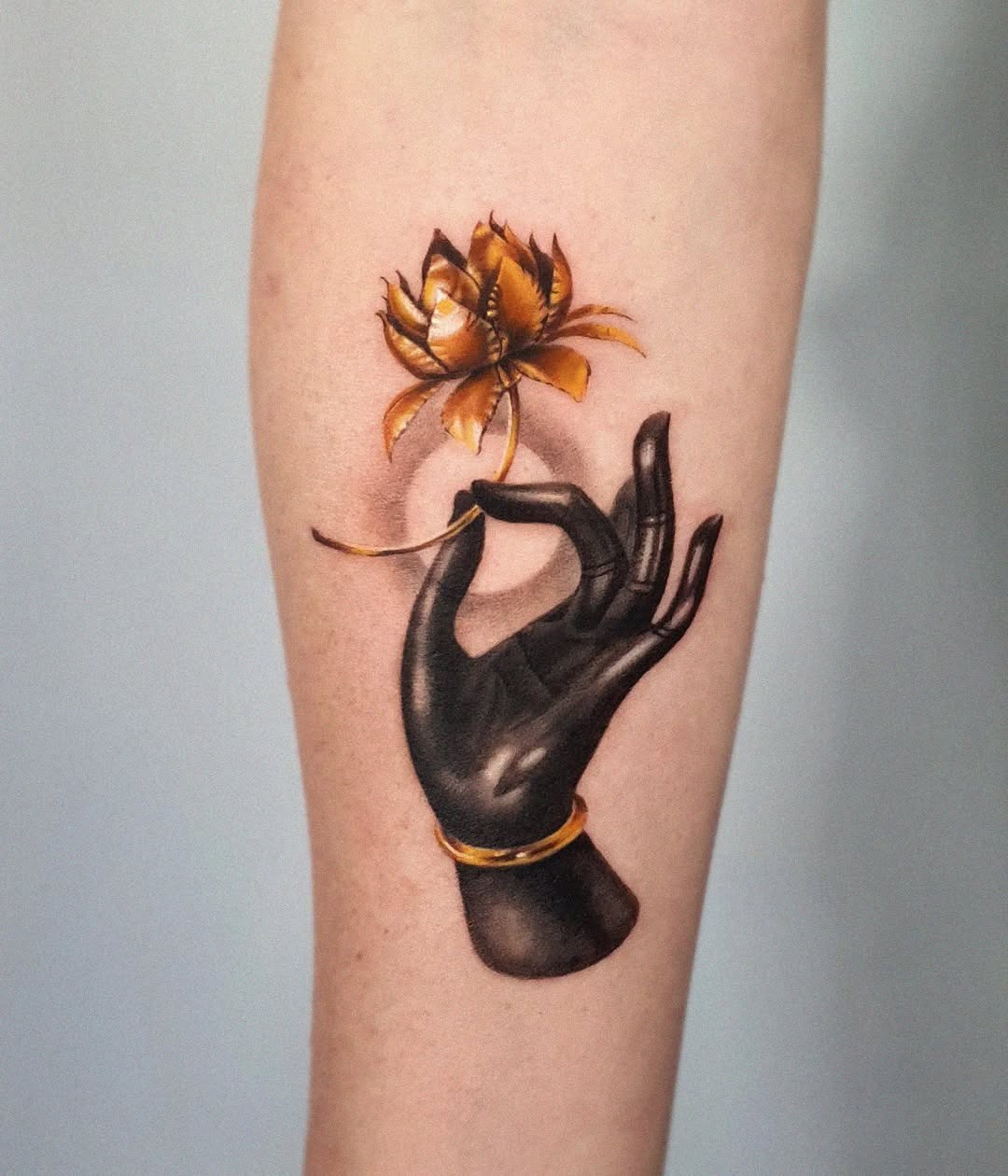 Elegant black hand with lotus flower tattoo Tattoo Design
