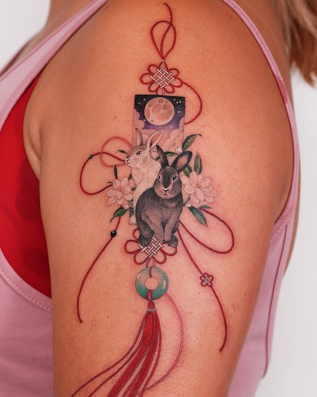 Elegant rabbits with floral and celestial designs Tattoo Design