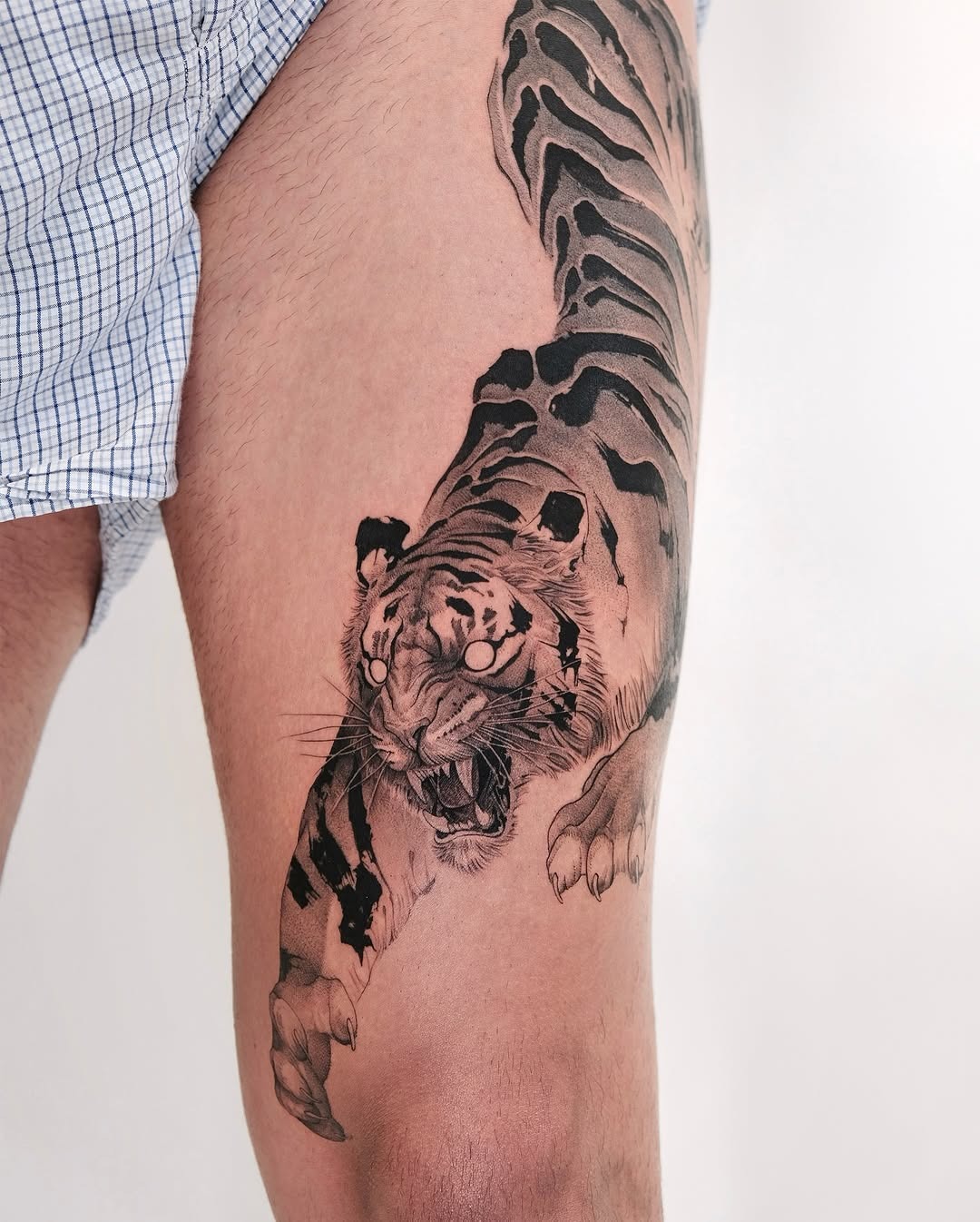 Fierce tiger tattoo design on thigh Tattoo Design