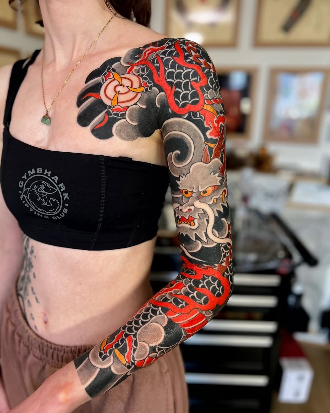 Intricate dragon and koi tattoo design on arm Tattoo Design