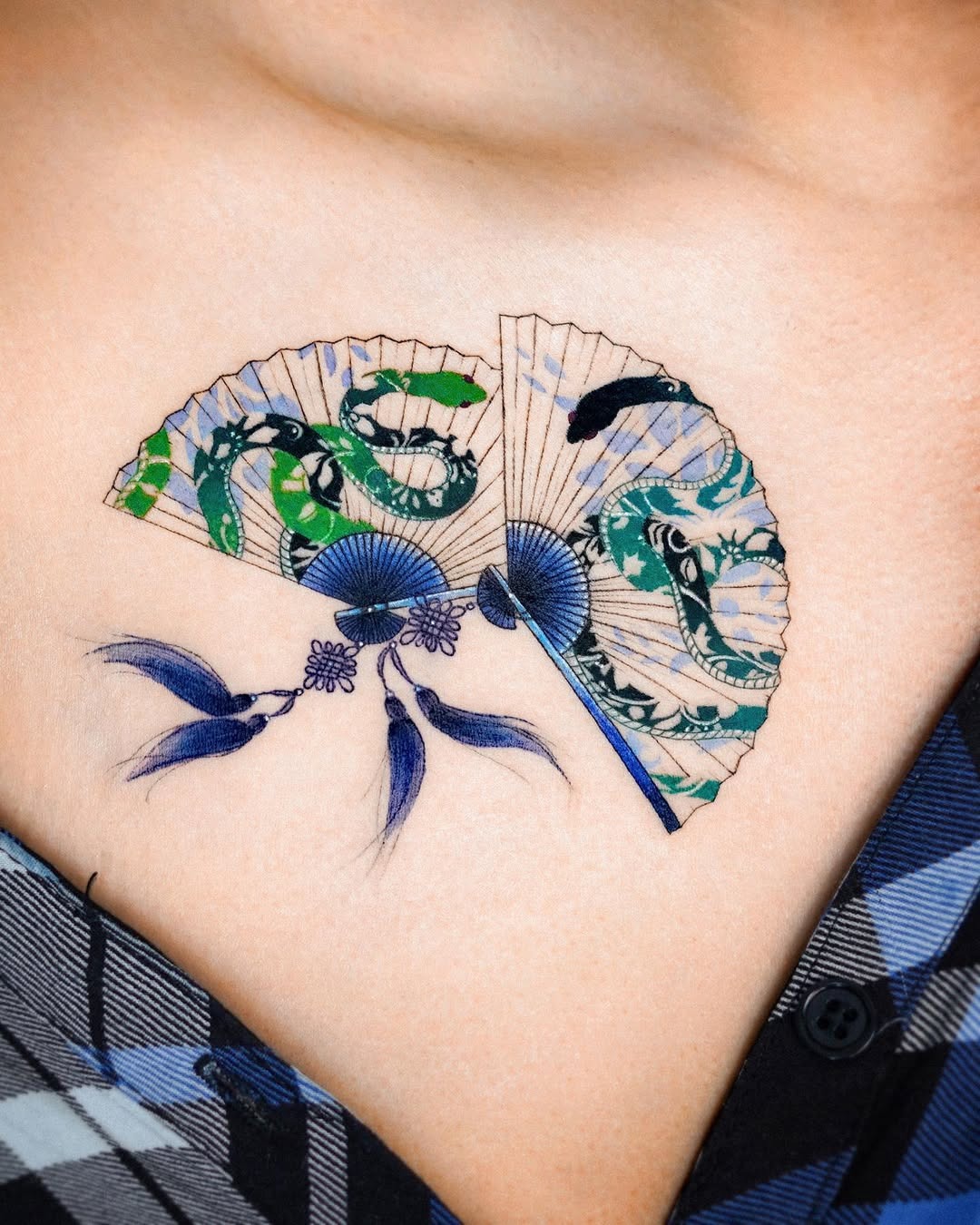 Intricate fan tattoo with serpent motifs Tattoo Design