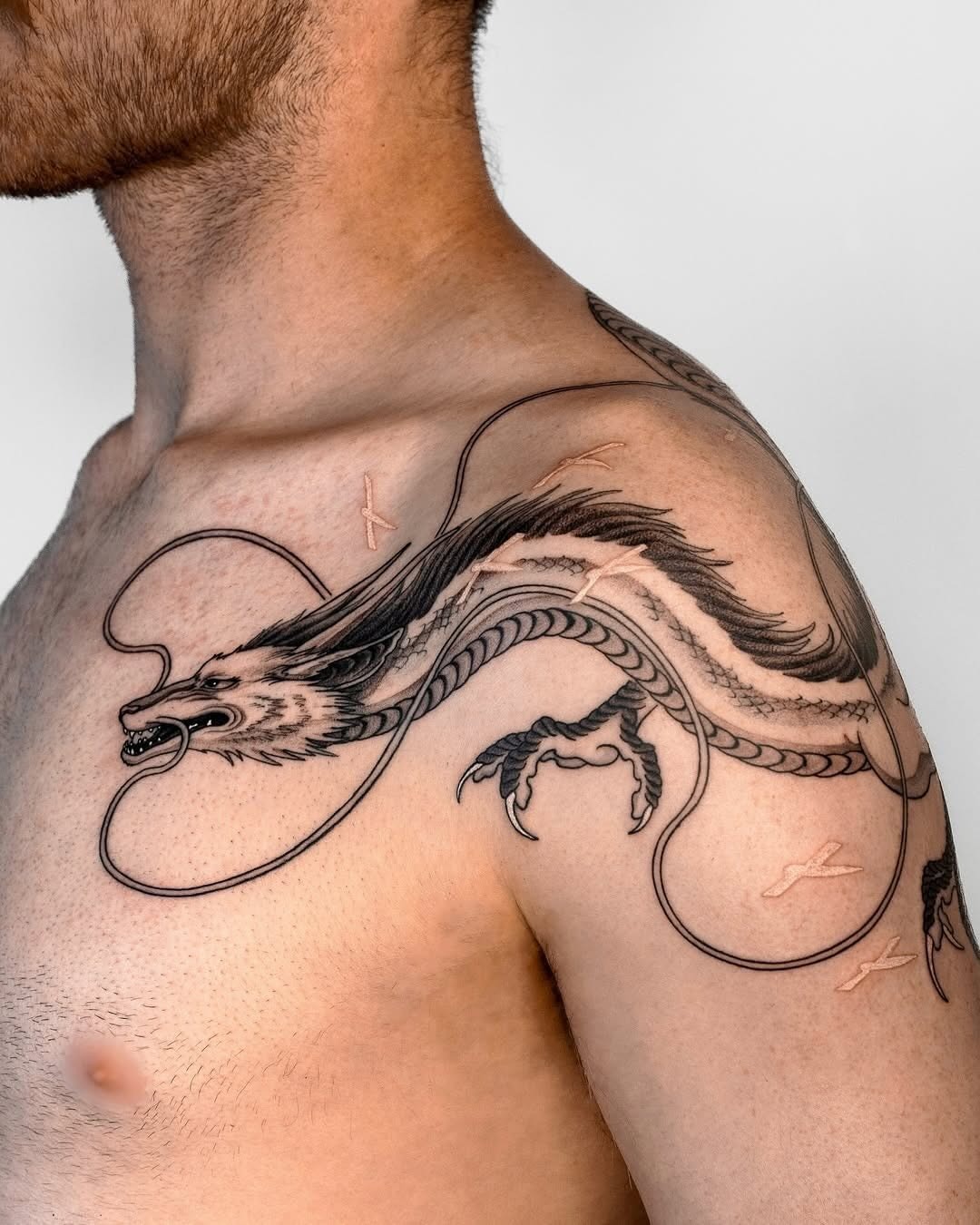 Majestic dragon tattoo design on shoulder Tattoo Design