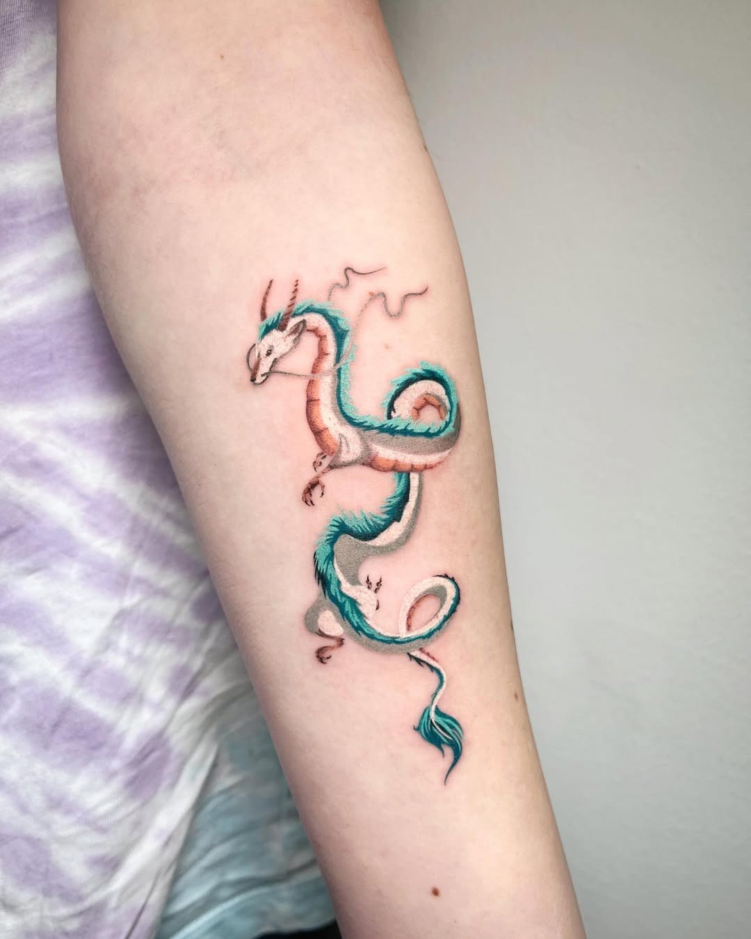Vibrant Oriental Dragon Inked on Skin Tattoo Design