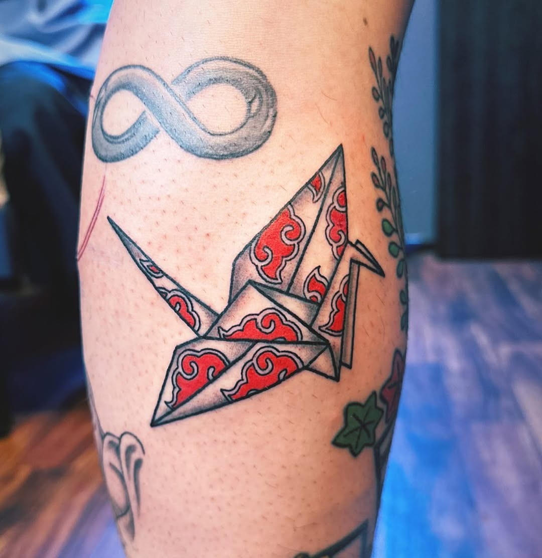 Bold Origami Crane Tattoo with Red Details Tattoo Design