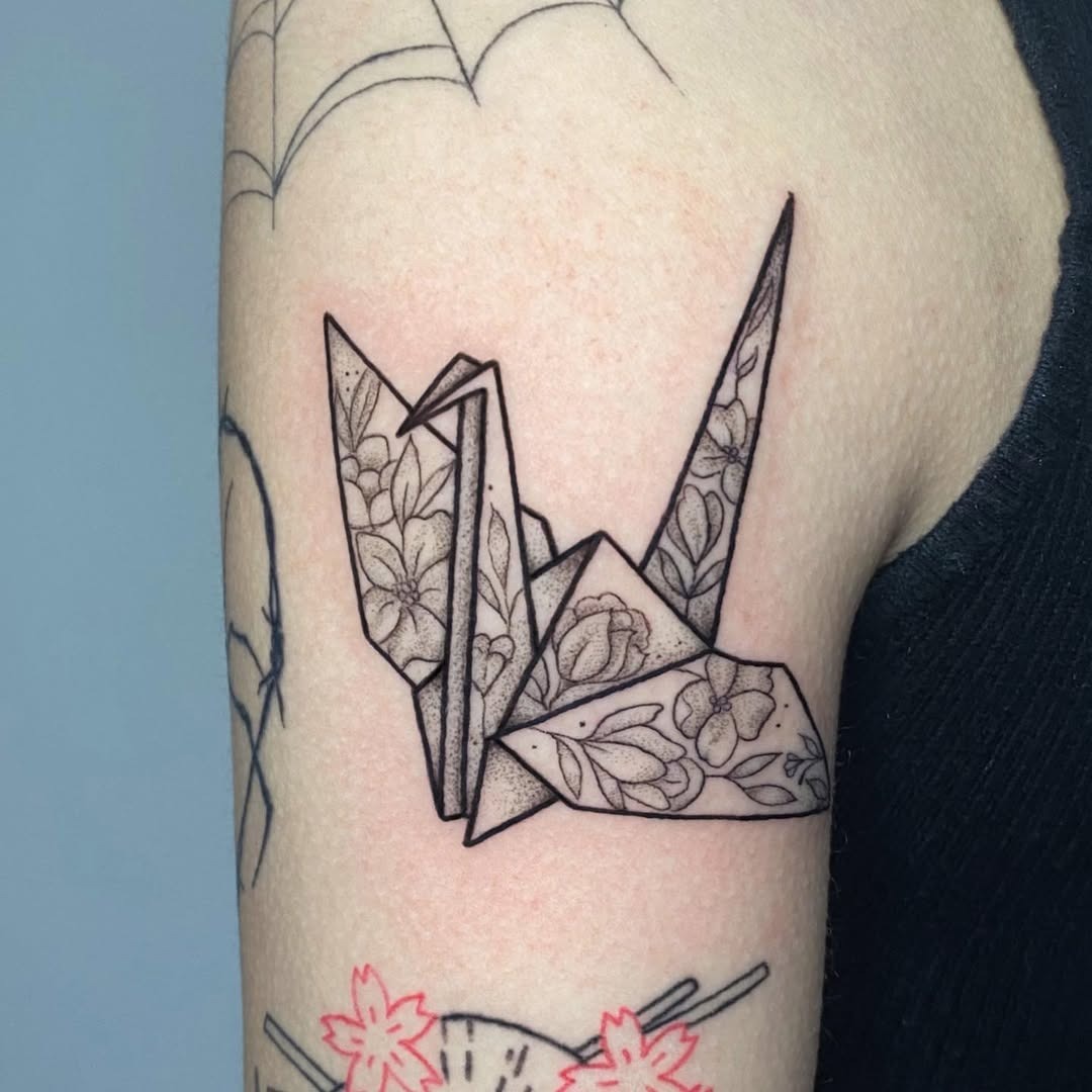 Elegant floral origami crane tattoo Piece Tattoo Design