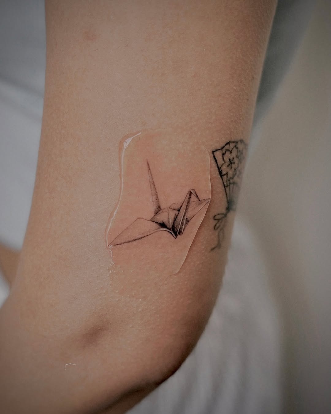 Elegant Origami Crane Tattoos on Skin Tattoo Design
