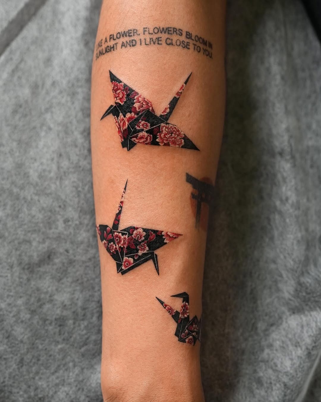 Elegant origami cranes adorned with floral patterns Tattoo Design