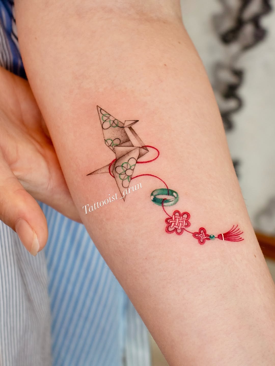 Intricate Origami Tattoo with Floral Accents Tattoo Design