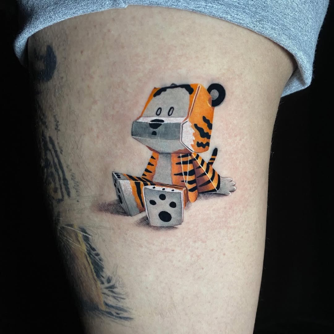 Playful origami tiger design on skin Tattoo Design