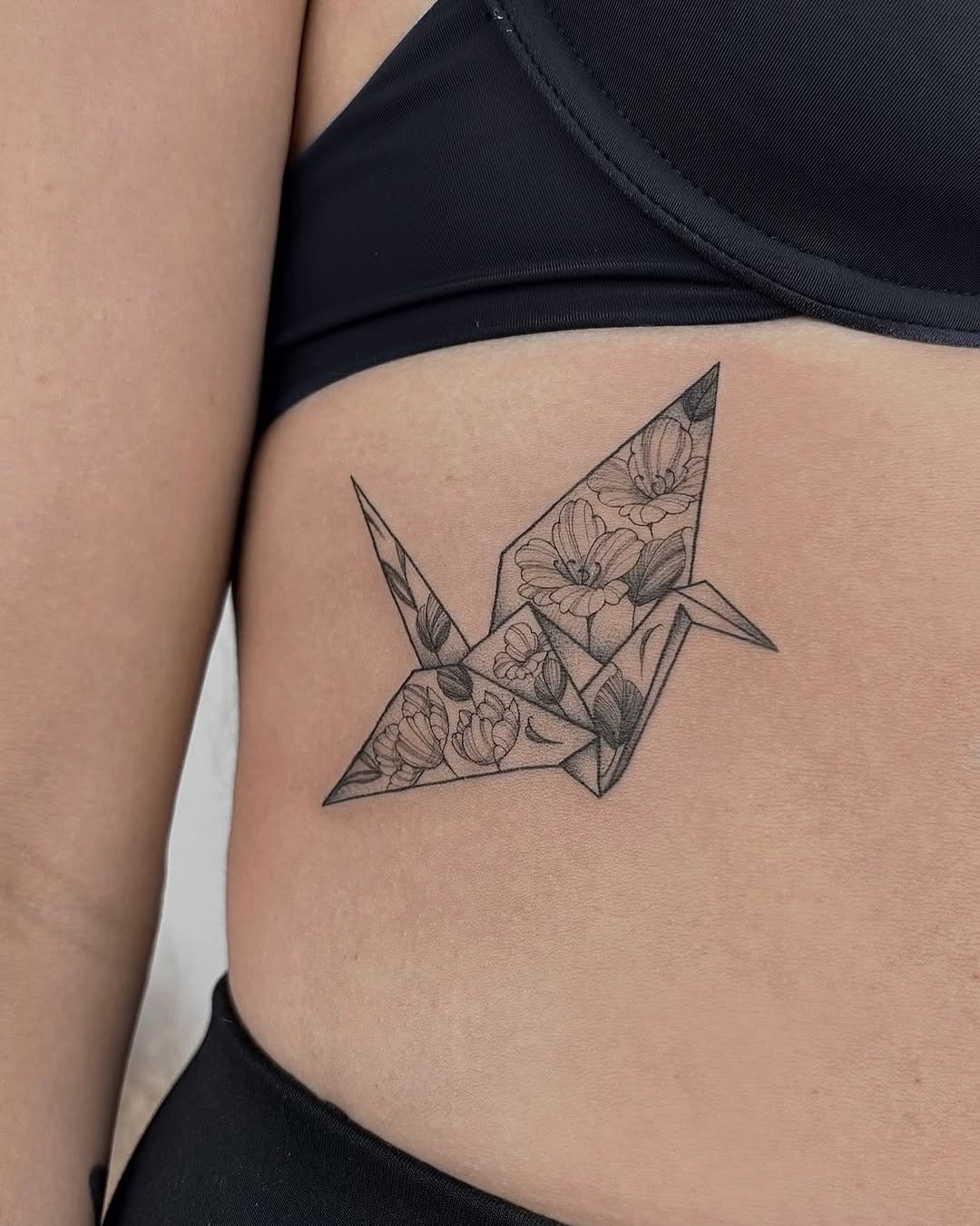 Stunning Origami Crane Tattoo with Floral Details Tattoo Design