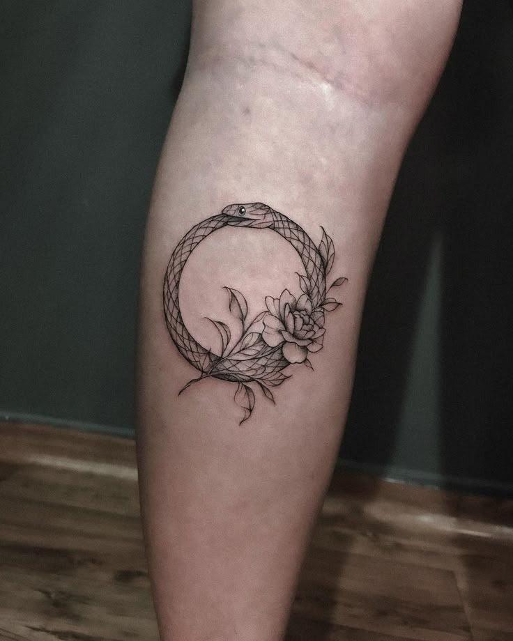 Elegant Florals with Snake Tattoo Design