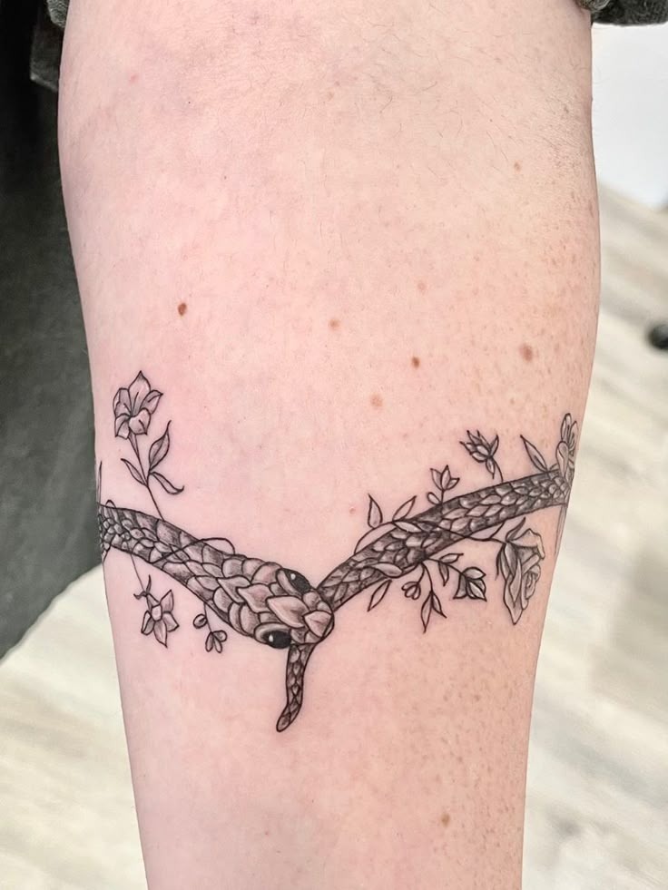 Floral Snake Wrap Tattoo Design
